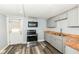 Cozy kitchen featuring stainless steel appliances and wood countertops at 352 W 28Th St, Indianapolis, IN 46208