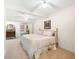 Bright bedroom featuring mirrored closet doors and a cozy bed at 3532 Clearwater Cir, Indianapolis, IN 46240