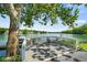 Lakeside deck overlooking peaceful water, perfect for relaxing and entertaining at 3532 Clearwater Cir, Indianapolis, IN 46240