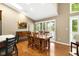 Bright dining area with wood table and seating near the kitchen at 3532 Clearwater Cir, Indianapolis, IN 46240