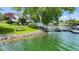 Beautiful waterfront home with dock, bench, and lake views at 3532 Clearwater Cir, Indianapolis, IN 46240