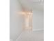 Hallway with neutral carpet leads to bedroom with plenty of natural light at 355 E Ohio St # 209, Indianapolis, IN 46204