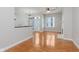 Bright living room features hardwood floors, fireplace and French doors to the outside at 355 E Ohio St # 209, Indianapolis, IN 46204