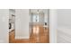 Open-concept living space with hardwood floors, fireplace, and ample natural light at 355 E Ohio St # 209, Indianapolis, IN 46204