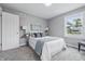 Bedroom with a white comforter, and stylish decor at 3906 Fletcher Ave, Indianapolis, IN 46203