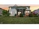 Backyard view of the screened-in porch and adjacent deck at 4017 Ivory Ct, Carmel, IN 46074