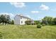 Spacious lawn wraps around this home and its screened in back porch at 4017 Ivory Ct, Carmel, IN 46074