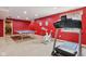 Finished basement with exercise area and ping pong table, illuminated by recessed lighting at 4017 Ivory Ct, Carmel, IN 46074