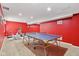Bright finished basement featuring both exercise equipment and a ping pong table at 4017 Ivory Ct, Carmel, IN 46074