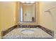 Stylish bathroom with granite countertop and decorative backsplash at 4017 Ivory Ct, Carmel, IN 46074