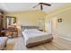 Inviting bedroom with a cozy ambiance, complemented by warm colors and soft lighting at 4017 Ivory Ct, Carmel, IN 46074