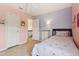 Cozy bedroom with pastel-colored walls, a single bed and white trim throughout the room at 4017 Ivory Ct, Carmel, IN 46074