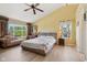 Bright bedroom with vaulted ceilings, large windows, and ample natural light at 4017 Ivory Ct, Carmel, IN 46074