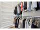 Organized walk-in closet with shelving and hanging racks at 4017 Ivory Ct, Carmel, IN 46074