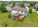 Aerial view of a home featuring a spacious deck and a well-maintained backyard at 4017 Ivory Ct, Carmel, IN 46074