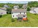 Aerial view of a home featuring a spacious deck and a well-maintained backyard at 4017 Ivory Ct, Carmel, IN 46074
