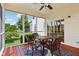 Charming screened-in porch with outdoor seating, offering a relaxing space to enjoy views of the yard at 4017 Ivory Ct, Carmel, IN 46074