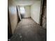 Bedroom needing renovation, featuring unfinished walls and flooring at 4206 Clark St, Anderson, IN 46013