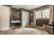 Cozy bedroom with a rocking horse and shelves for storage and decor, perfect for or as a guest room at 4415 N Illinois St, Indianapolis, IN 46208