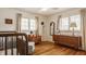 Bright bedroom with natural light, hardwood floors, and vintage furniture, offering a cozy and inviting atmosphere at 4415 N Illinois St, Indianapolis, IN 46208