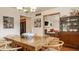 Bright dining room features hardwood floors, statement lighting, and a seamless transition into the living space at 4415 N Illinois St, Indianapolis, IN 46208