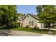 Charming home with a well-maintained lawn and mature landscaping at 4428 Edinburgh Pt, Indianapolis, IN 46228
