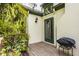 Cozy patio featuring mature trees and plants, with a grill at 4428 Edinburgh Pt, Indianapolis, IN 46228
