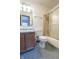 Cozy bathroom with a tub/shower combo and wooden vanity at 4428 Tucson Dr, Indianapolis, IN 46241