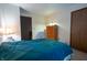 Bedroom features a comfortable bed and ample closet space at 4428 Tucson Dr, Indianapolis, IN 46241