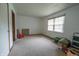 Bedroom with neutral carpet, white walls, and good natural light at 4428 Tucson Dr, Indianapolis, IN 46241