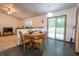 Dining area features tile flooring and sliding doors to the outside at 4428 Tucson Dr, Indianapolis, IN 46241
