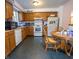 Functional kitchen features wood cabinets and essential appliances at 4428 Tucson Dr, Indianapolis, IN 46241