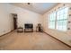Cozy living room with plush carpet and an abundance of natural light at 4428 Tucson Dr, Indianapolis, IN 46241
