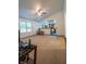 Spacious living room with a fan and a view of the kitchen at 4428 Tucson Dr, Indianapolis, IN 46241