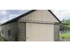 Exterior shot of a barn with cinder block base and a corrugated metal upper structure at 4849 S 500 E, Greenfield, IN 46140