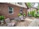 Relaxing backyard space featuring patio furniture, plants, and a peaceful ambiance at 5024 N Kenwood Ave, Indianapolis, IN 46208