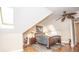 Charming bedroom featuring skylights, ceiling fan, and a comfortable queen-sized bed at 5024 N Kenwood Ave, Indianapolis, IN 46208