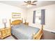 Comfortable bedroom with natural light, hardwood floors, and classic furnishings, creating a relaxing space at 5024 N Kenwood Ave, Indianapolis, IN 46208