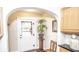 Bright entryway featuring a white door, potted plant, and classic trim, offering a welcoming ambiance at 5024 N Kenwood Ave, Indianapolis, IN 46208