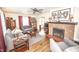 Charming living room showcasing hardwood floors and fireplace at 5024 N Kenwood Ave, Indianapolis, IN 46208
