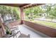 Relax on the porch with its brick surround and views of the neighborhood at 5024 N Kenwood Ave, Indianapolis, IN 46208