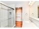 Bathroom featuring a shower, vanity with marble countertop, and a walk-in closet at 5884 Compton St, Indianapolis, IN 46220