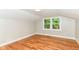 Inviting bedroom with hardwood floors, and a window at 5884 Compton St, Indianapolis, IN 46220