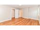 Bedroom featuring hardwood floors and access to ensuite bathroom and closet at 5884 Compton St, Indianapolis, IN 46220