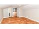 Spacious bedroom featuring hardwood floors and easy access to a private bathroom at 5884 Compton St, Indianapolis, IN 46220