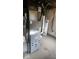 A water heater is visible next to the HVAC unit at 5884 Compton St, Indianapolis, IN 46220