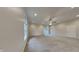 Large bedroom offering recessed lighting, a ceiling fan, neutral carpet, and a private door at 5939 Brendonridge S Ct, Indianapolis, IN 46226