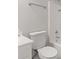 Bright bathroom with modern fixtures, including a white toilet and a shower-tub combination at 6227 Long River Ln, Indianapolis, IN 46221