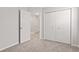 Bedroom with neutral carpeting and a closet at 6227 Long River Ln, Indianapolis, IN 46221