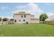 The backyard is fenced with a grassy lawn at 6320 River Valley Way, Indianapolis, IN 46221
